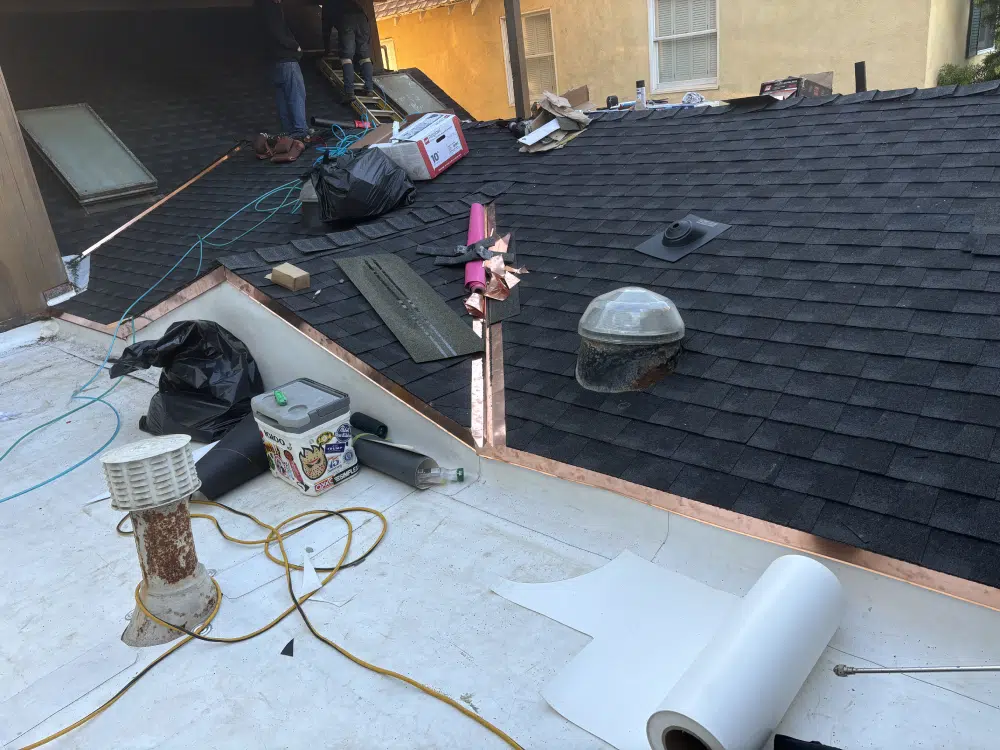 A roof being repaired in orange county