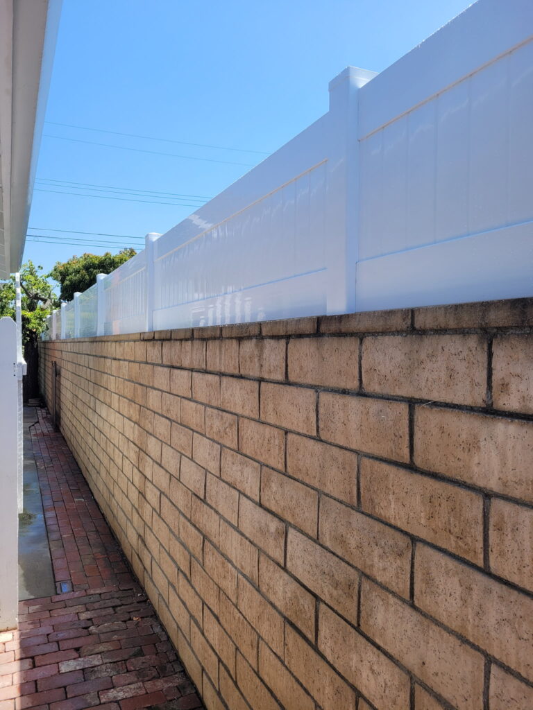 vinyl toppers on block wall in orange county